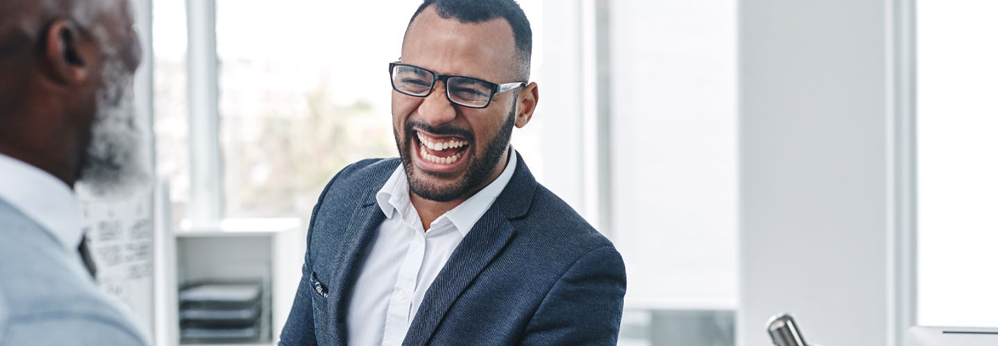 Business men laughing