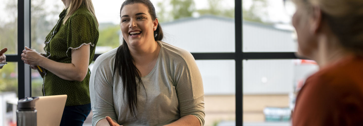 girl laughing in meeting