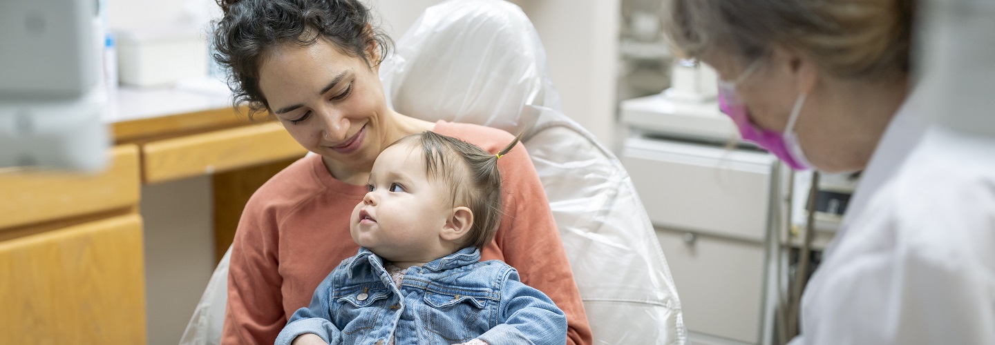 mom and baby at dentist