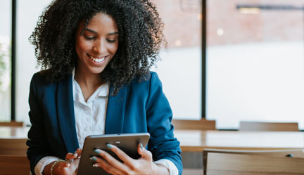 Woman looking at tablet